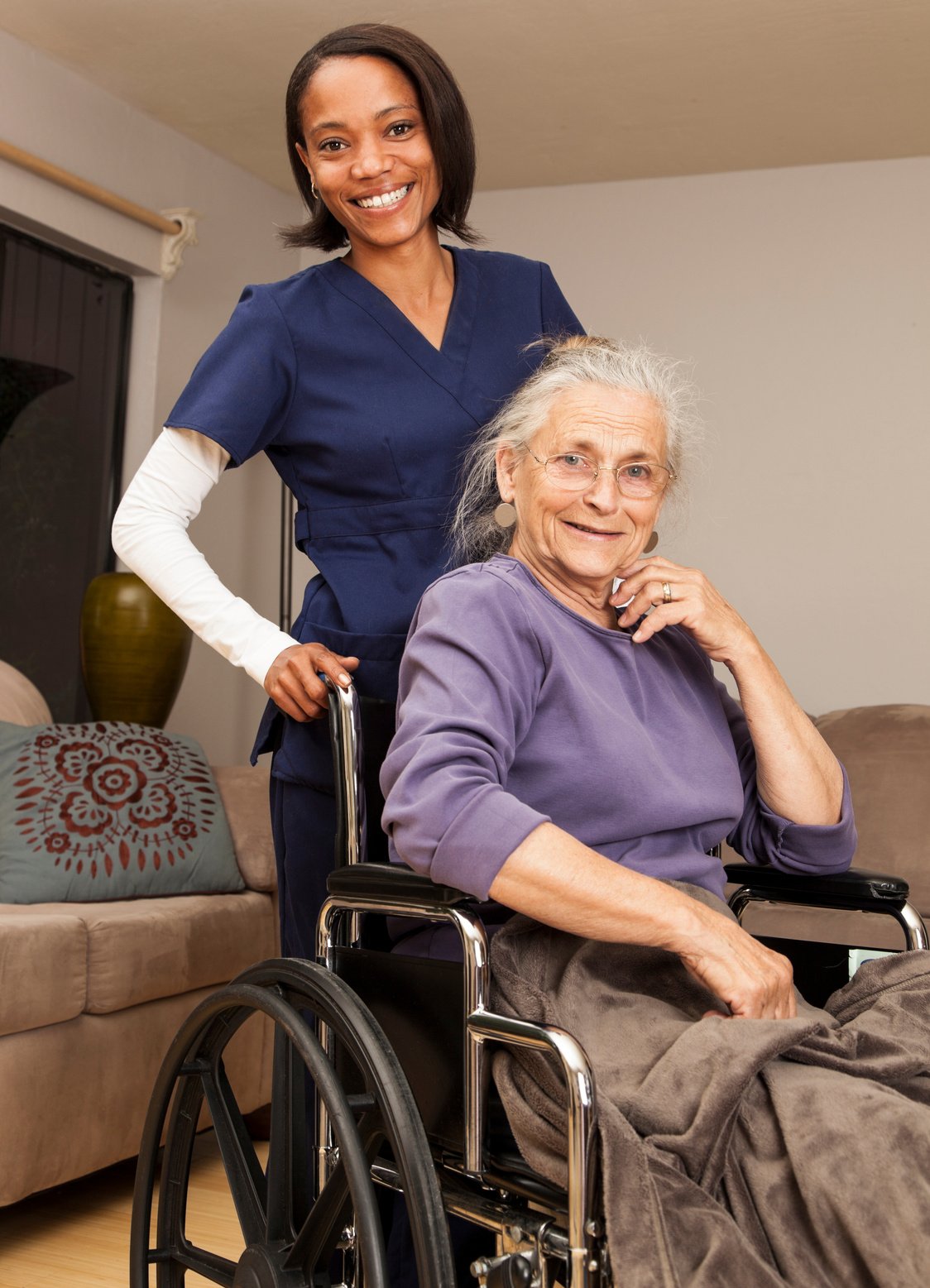 home caregiver with woman in wheelchair